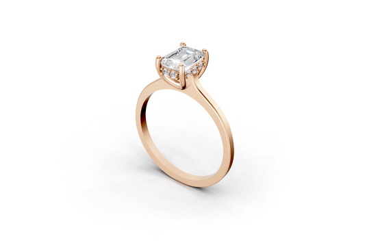 Halo Bloom Emerald engagement ring with diamond halo and emerald center stone by Duda Jewels.