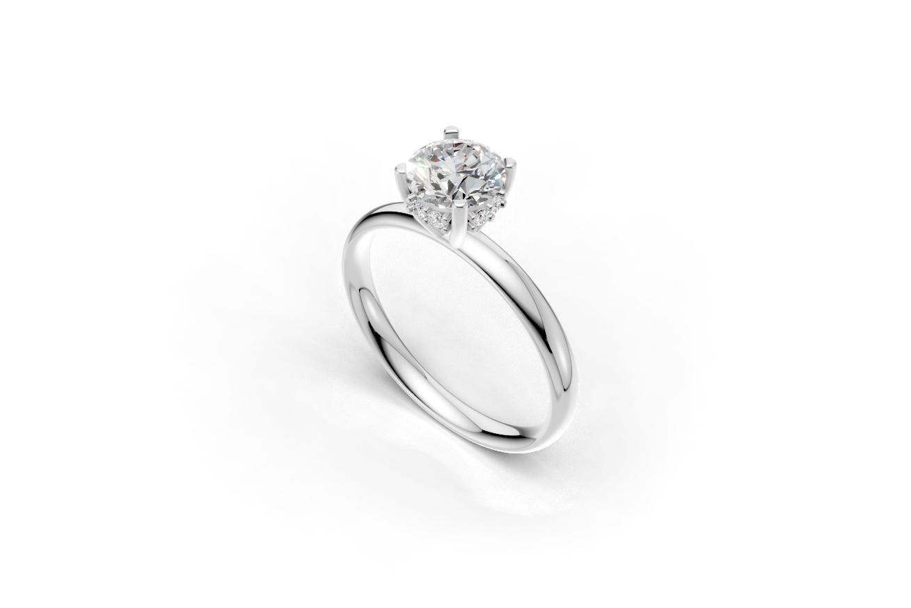 Handmade engagement ring with a round brillant cut diamond by DUDAjewels