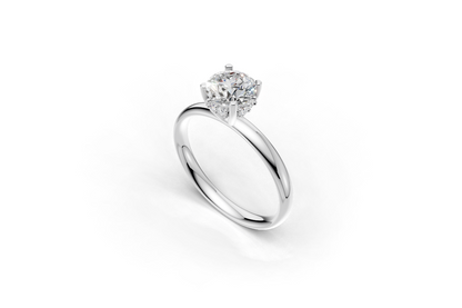 Handmade engagement ring with a round brillant cut diamond by DUDAjewels
