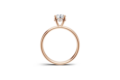 Handmade hidden halo engagement ring with a round brillant cut diamond by DUDAjewels
