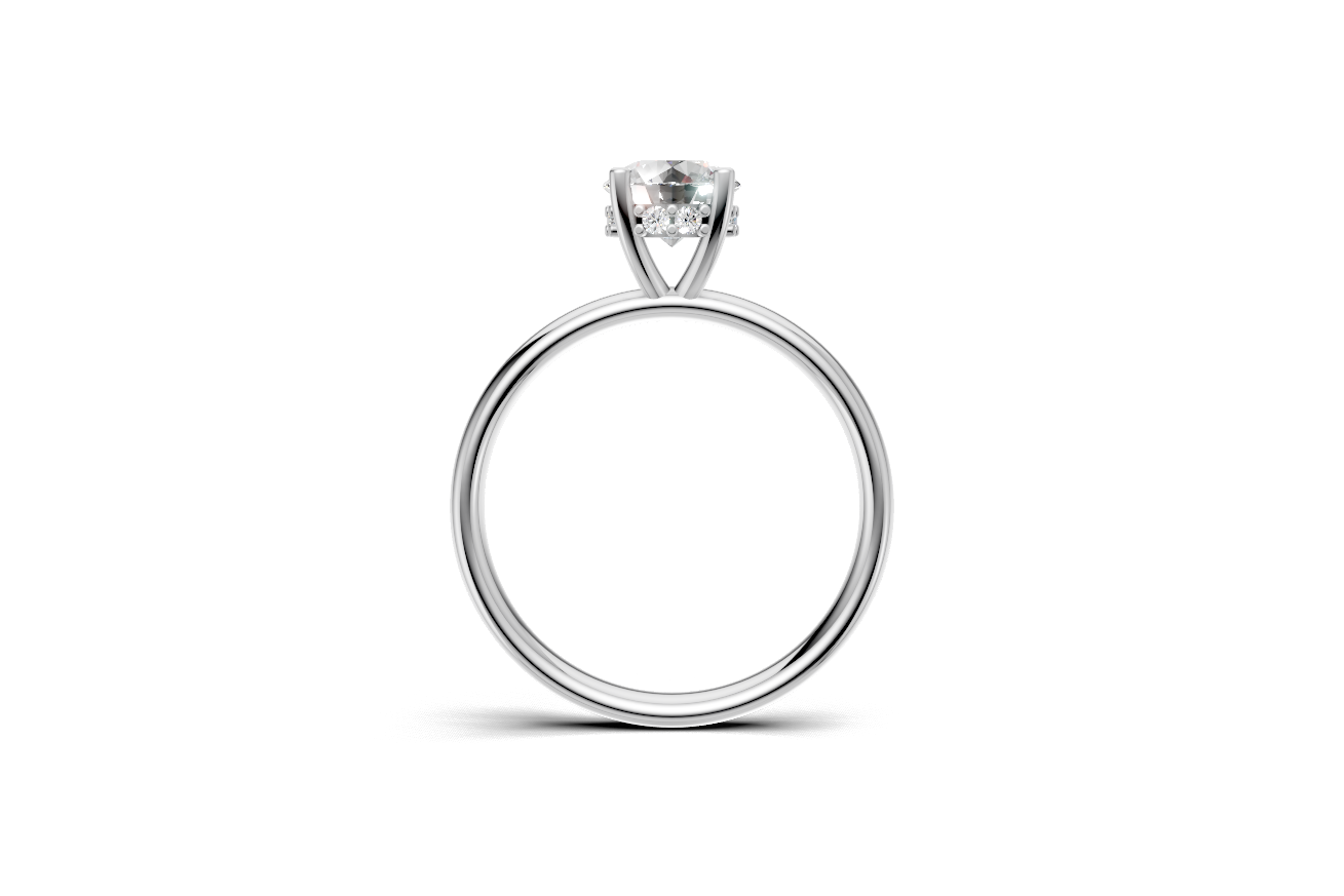 Handmade hidden halo engagement ring with a round brillant cut diamond by DUDAjewels