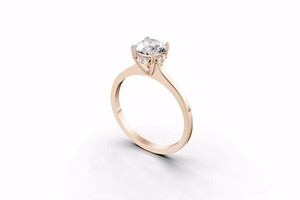 Halo Bloom Round engagement ring with diamond hidden halo and round center stone by Duda Jewels.