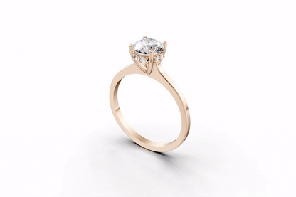 Halo Bloom Round engagement ring with diamond hidden halo and round center stone by Duda Jewels.