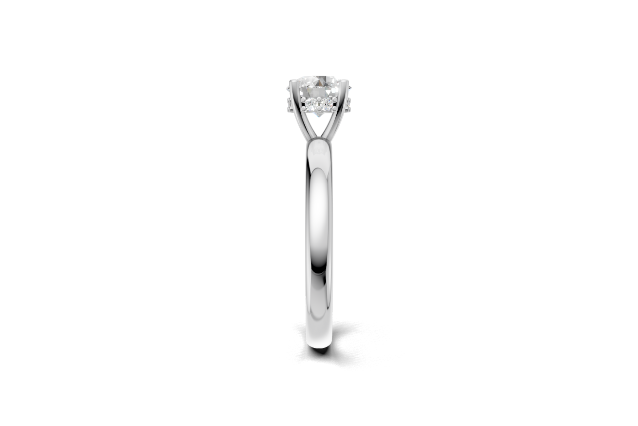 Handmade hidden halo engagement ring with a round brillant cut diamond by DUDAjewels