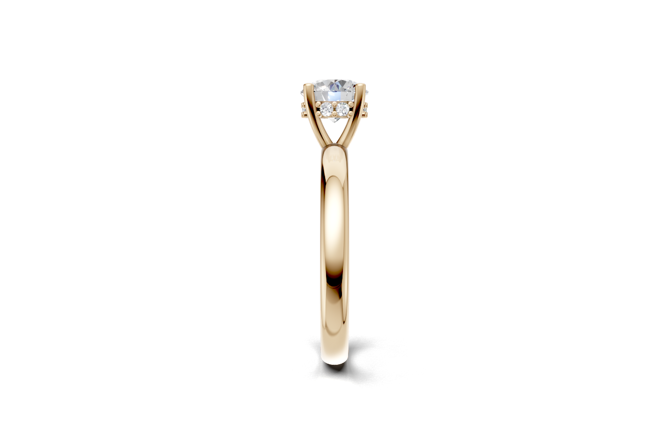 Handmade hidden halo engagement ring with a round brillant cut diamond by DUDAjewels