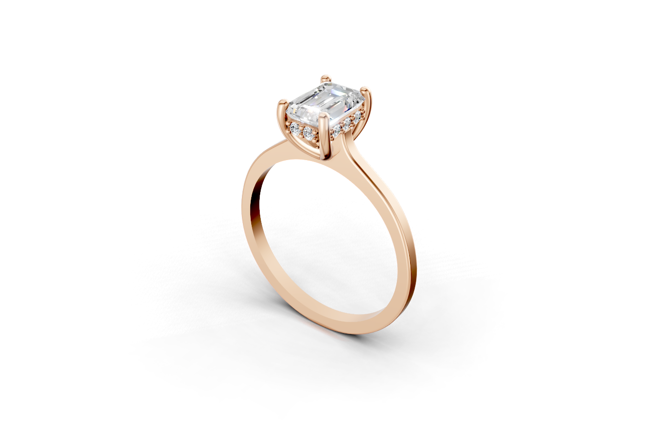 Halo Bloom Emerald engagement ring with diamond halo and emerald center stone by Duda Jewels.