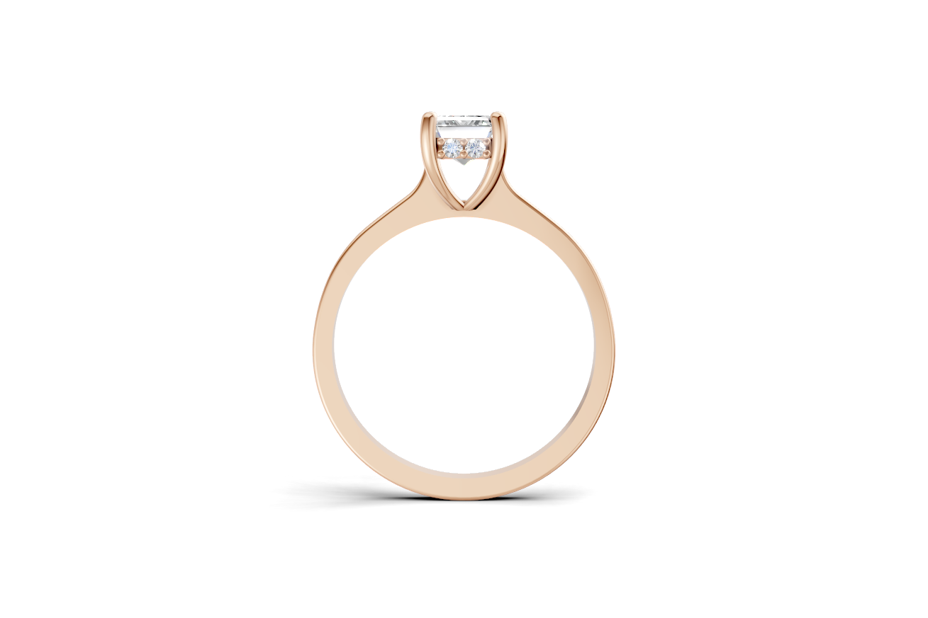 Rose gold ring with a diamond on a white background by DUDAjewels