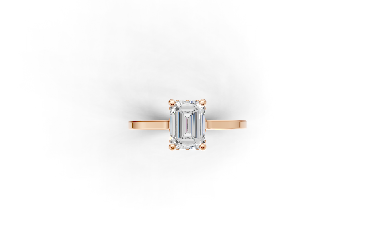 Halo Bloom Emerald engagement ring with diamond halo and emerald center stone by Duda Jewels.