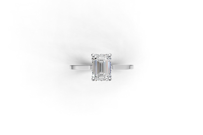 Halo Bloom Emerald engagement ring with diamond halo and emerald center stone by Duda Jewels.