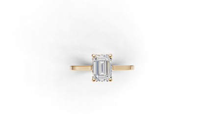 Halo Bloom Emerald engagement ring with diamond halo and emerald center stone by Duda Jewels.