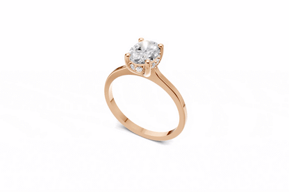Halo Bloom Oval engagement ring with diamond hidden halo and oval center stone by Duda Jewels.