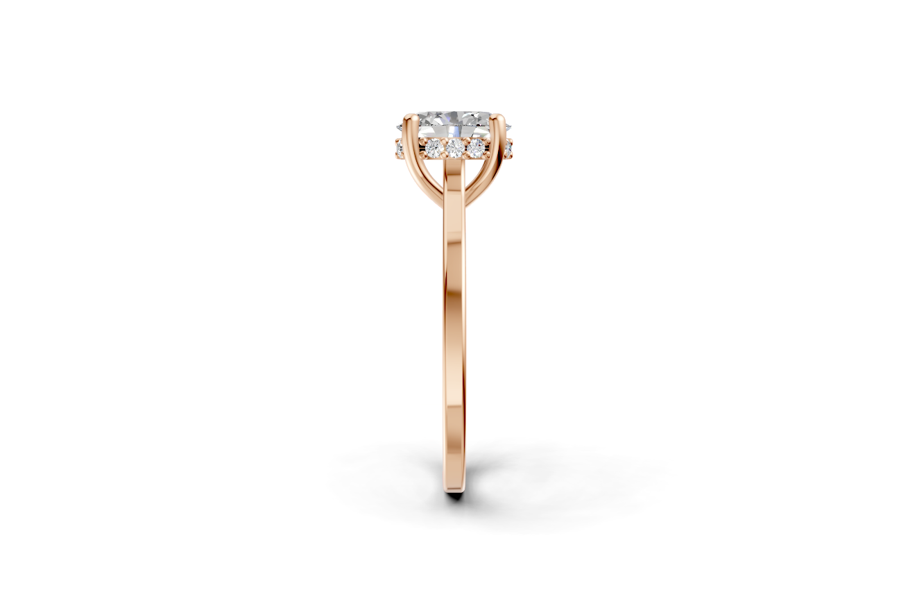 Halo Bloom Oval engagement ring with diamond halo and oval center stone by Duda Jewels.