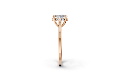 Halo Bloom Oval engagement ring with diamond halo and oval center stone by Duda Jewels.