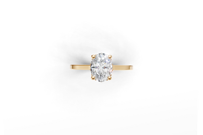 Halo Bloom Oval engagement ring with diamond halo and oval center stone by Duda Jewels.