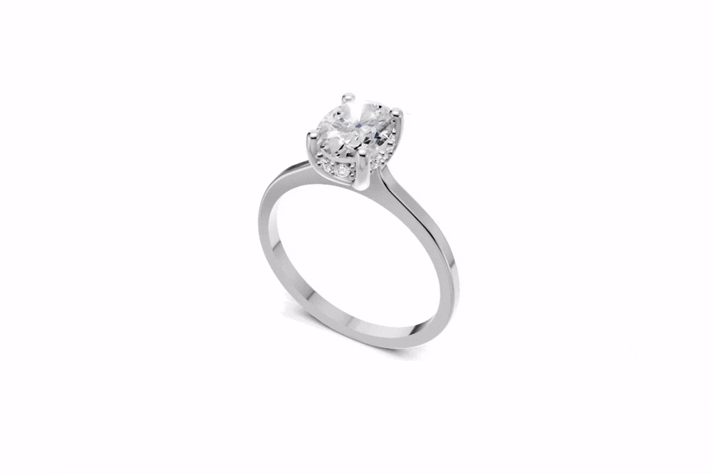 Halo Bloom Oval engagement ring with diamond hidden halo and oval center stone by Duda Jewels.
