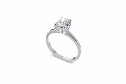 Halo Bloom Oval engagement ring with diamond hidden halo and oval center stone by Duda Jewels.