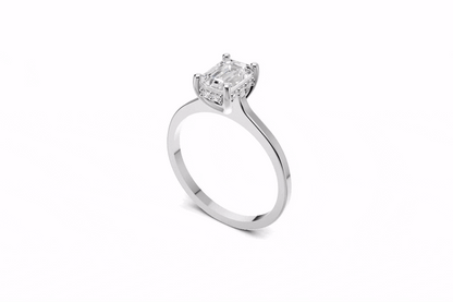 Halo Bloom Emerald engagement ring with diamond hidden halo and emerald center stone by Duda Jewels.