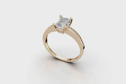 Μονόπετρο με emerald cut διαμάντι και πλαϊνές εσωτερικά στην γάμπα!