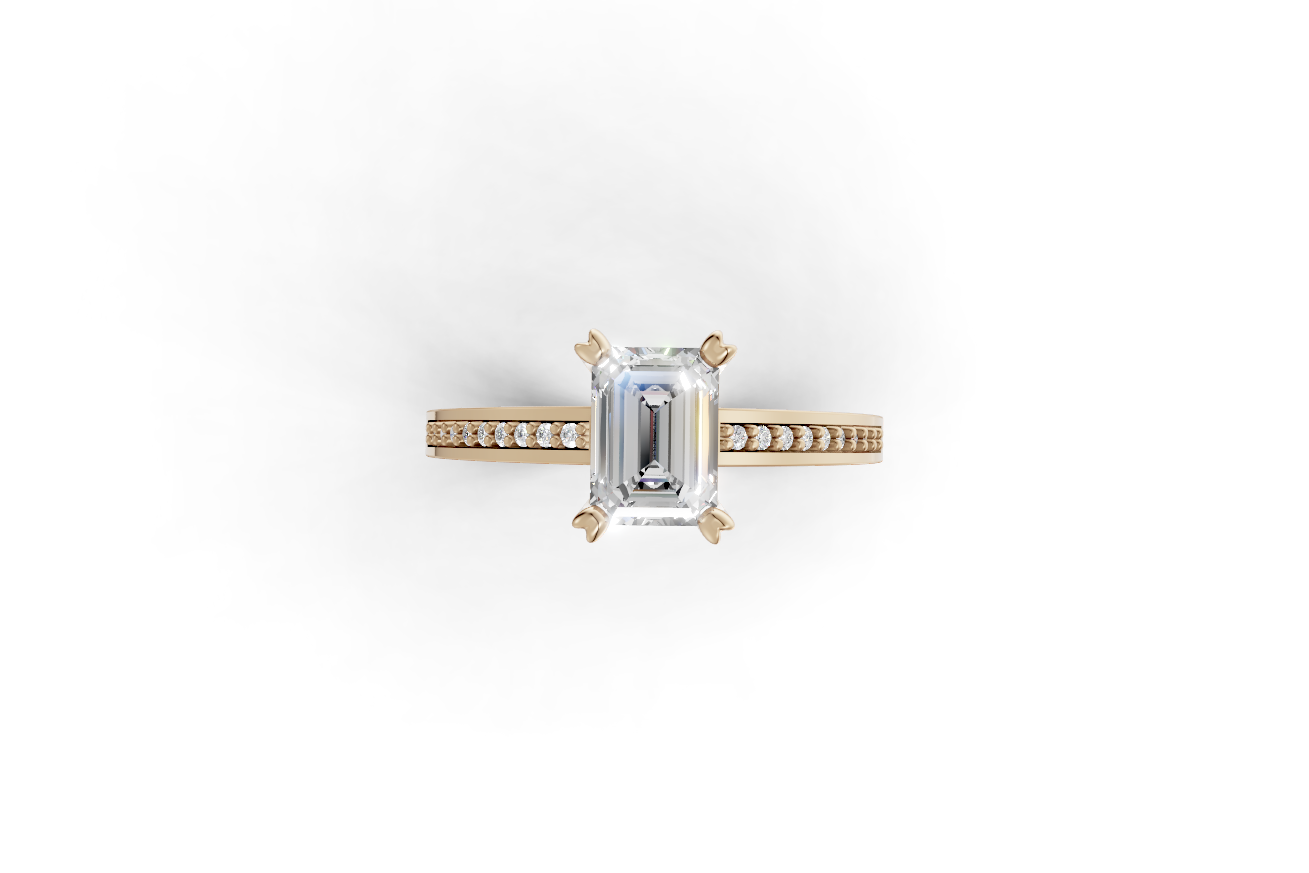 Μονόπετρο με emerald cut διαμάντι και πλαϊνές εσωτερικά στην γάμπα!