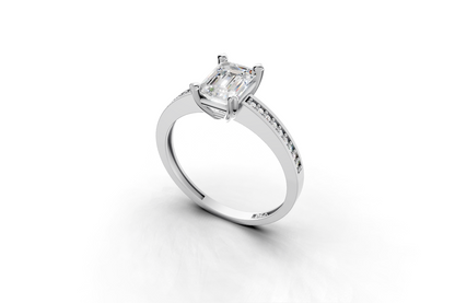 Μονόπετρο με emerald cut διαμάντι και πλαϊνές εσωτερικά στην γάμπα!